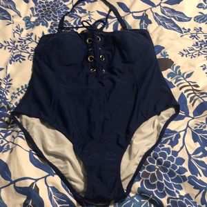 New never worn, navy size 18 Venus one piece
